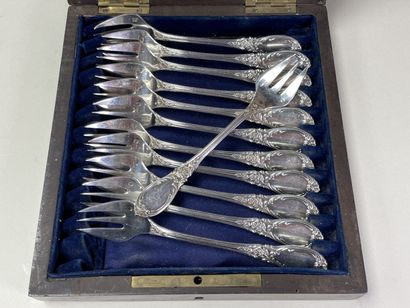Ecrin de douze fourchettes à huitres, par...