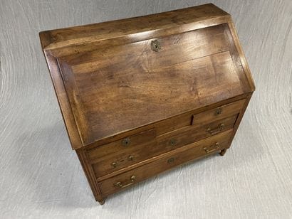 Scriban desk in walnut, opening to four drawers...