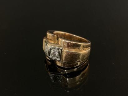 Gold tank ring set with two diamonds.
Weight:...