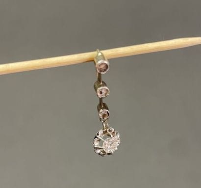 Platinum pendant set with old cut diamonds,...