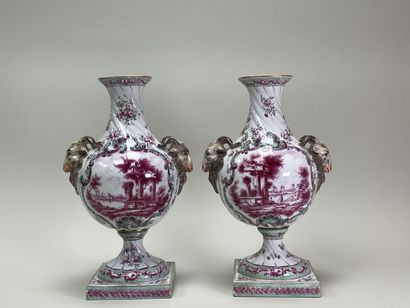 Pair of porcelain vases on pedestal, the...