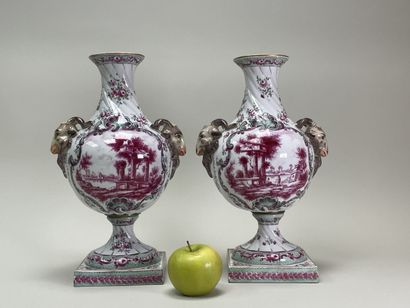 Pair of porcelain vases on pedestal, the...