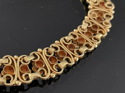 * Cuff bracelet with gold flowers 
Gold 750°/00
L:...