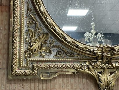 Wood and stucco mirror gilded and lacquered...