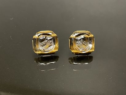 Pair of gold cufflinks and cameos in the...