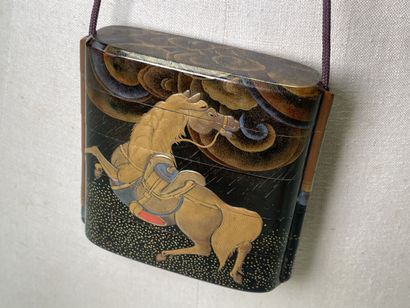 Lacquered wood inro with four squares decorated...