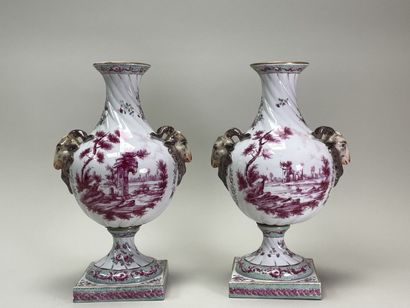 Pair of porcelain vases on pedestal, the...