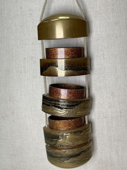Inro with four boxes gilded lacquer said...