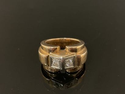Gold tank ring set with two diamonds.
Weight:...