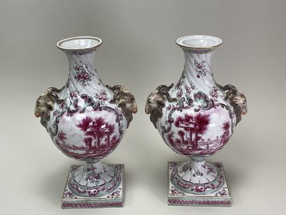 Pair of porcelain vases on pedestal, the...