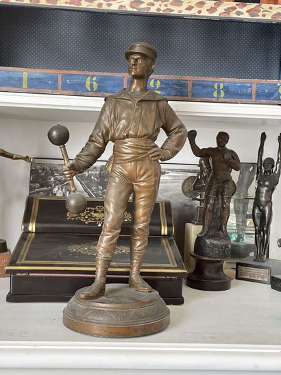 HALTEROPHILIA
Athlete with dumbbell.
Statuette...