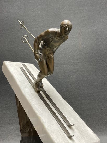 The skier. 
Sculpture in patinated bronze...