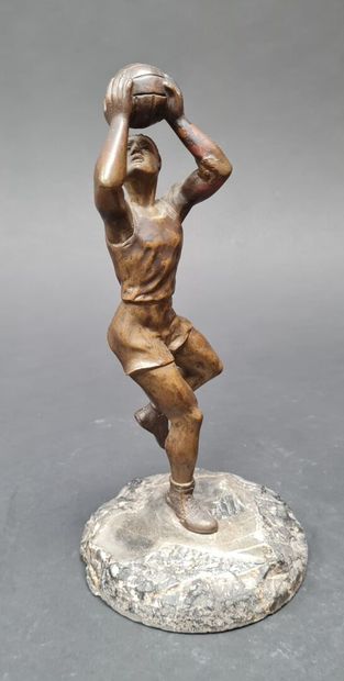 BASKETBALL
Statuette in patinated regula.
Marble...