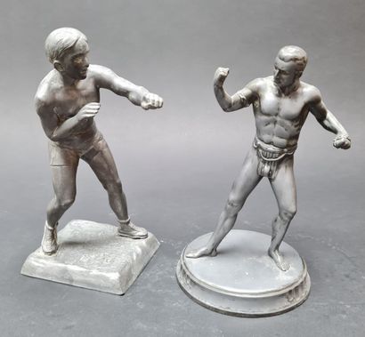 LUTTE: two alloy statuettes.
H: 24 and 22...