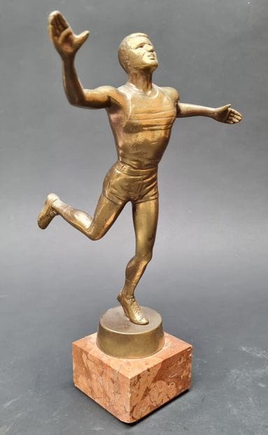 ATHLETICS:
Runner
Bronze, on pink marble.
Height:...