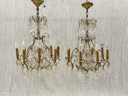 Pair of eight-light chandeliers. 
H. :83...