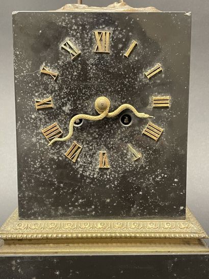 Ostrich clock.
Black marble base surmounted...