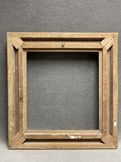 Wood and gilded stucco frame. 
Regency style
Interior...