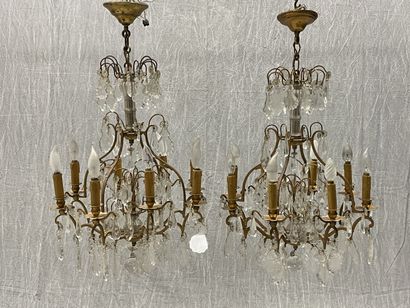 Pair of eight-light chandeliers. 
H. :83...