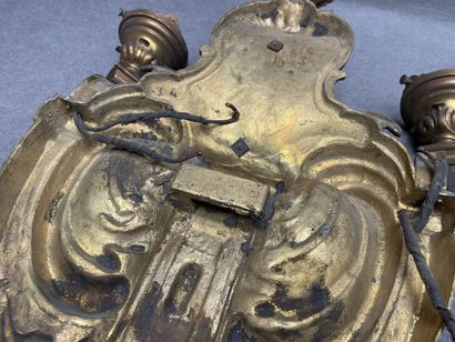 Large two-light bronze sconce with putto...