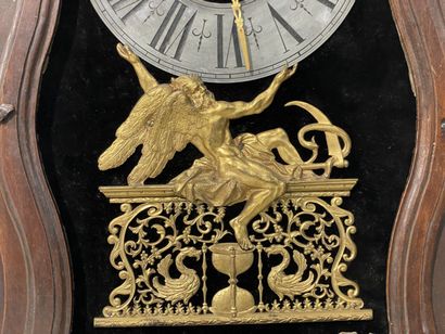 Carved oak floor clock, pewter dial supported...
