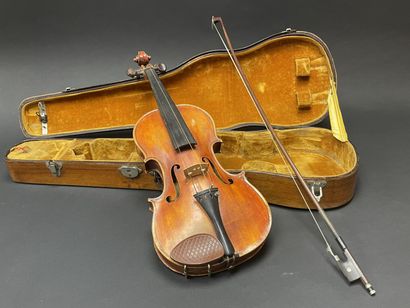 Violin in case, bearing a label 