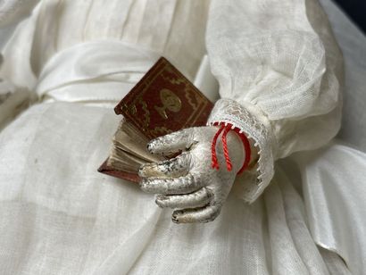Parisian communion doll with missal and cross....