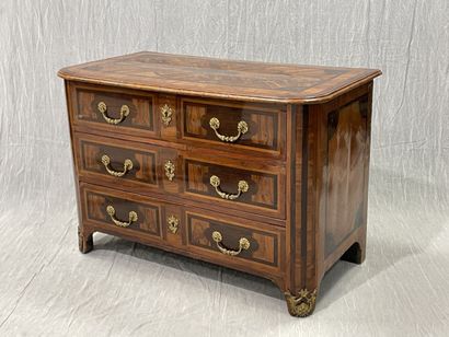 Rosewood-fringed chest of drawers, opening...