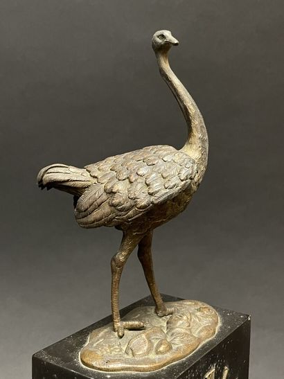 Ostrich clock.
Black marble base surmounted...