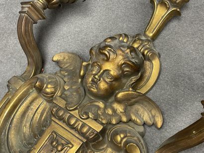Large two-light bronze sconce with putto...