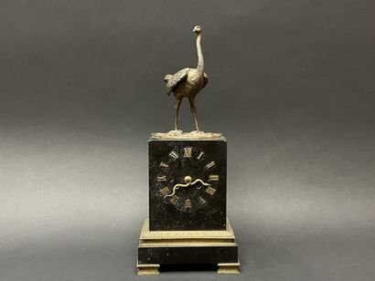 Ostrich clock.
Black marble base surmounted...