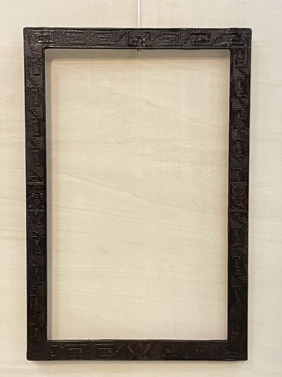 Leather frame decorated with drawings of...