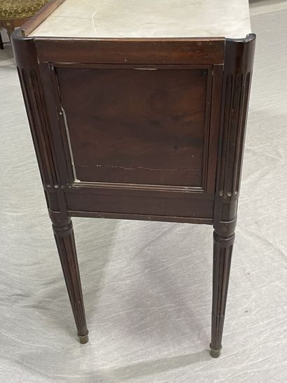 Mahogany console with two doors, white marble...
