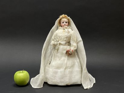 Parisian communion doll with missal and cross....