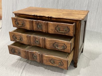 Molded walnut chest of drawers, crossbow...