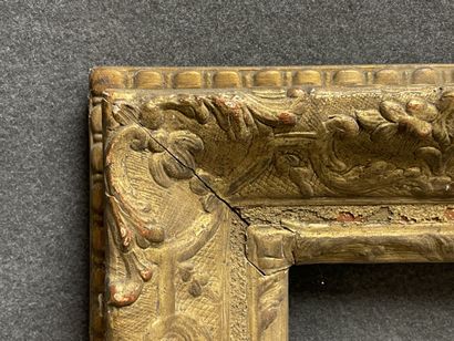 Wood and gilded stucco frame. 
Regency style
Interior...