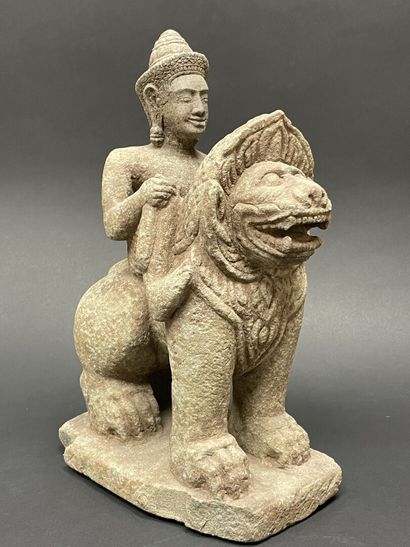 Vishnu riding the roaring Singha Lion, holding...
