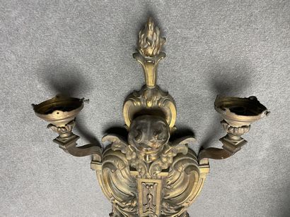 Large two-light bronze sconce with putto...