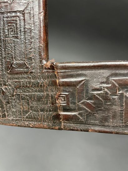 Leather frame decorated with drawings of...