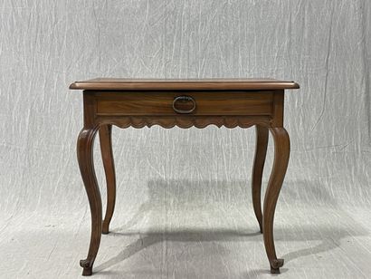 Walnut coffee table, opening to a drawer...