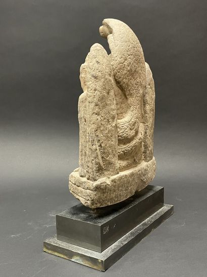 Buddhist triad depicting Mucalinda Buddha...
