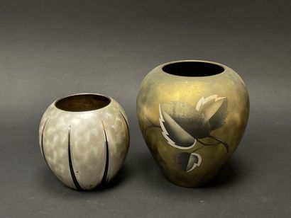 Two ball vases in dinanderie.
Art deco.
H....