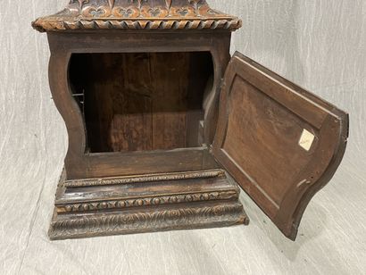 Carved oak floor clock, pewter dial supported...