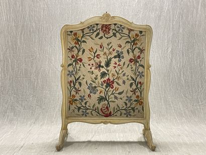 Molded wood and tapestry fireside.
Louis...