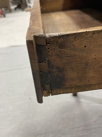 Walnut coffee table, opening to a drawer...