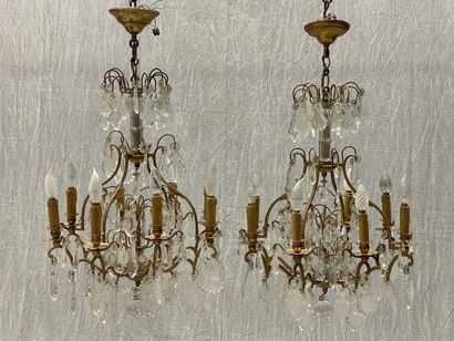 Pair of eight-light chandeliers. 
H. :83...