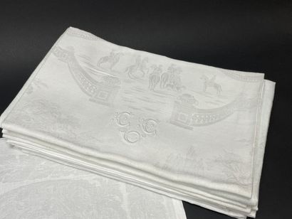 Set of nine large damask linen napkins decorated...