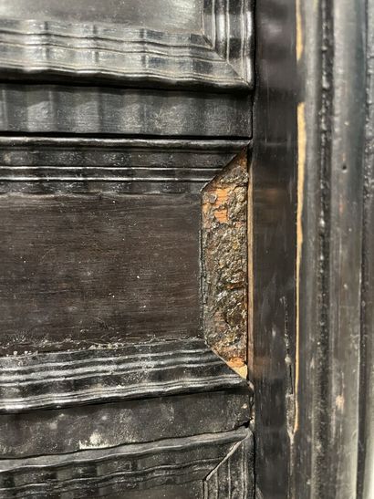 Cabinet in blackened wood opening to 9 drawers...