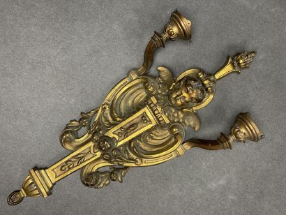 Large two-light bronze sconce with putto...