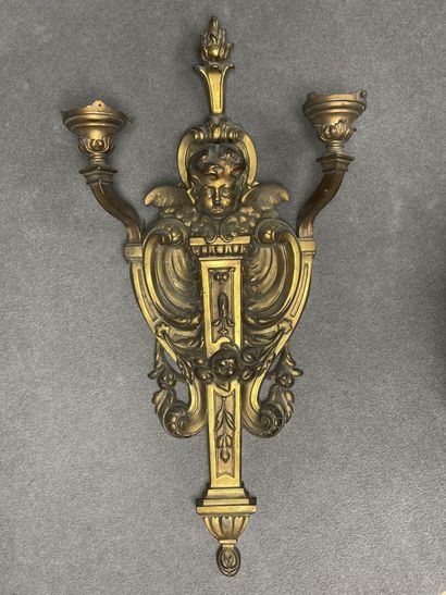 Large two-light bronze sconce with putto...
